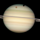 Illustration for article titled Hubble Captures Four Moons Transiting In Front Of Saturn!